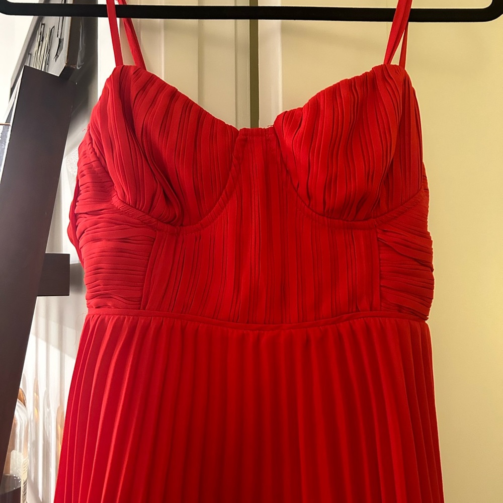 Red pleated midi dress